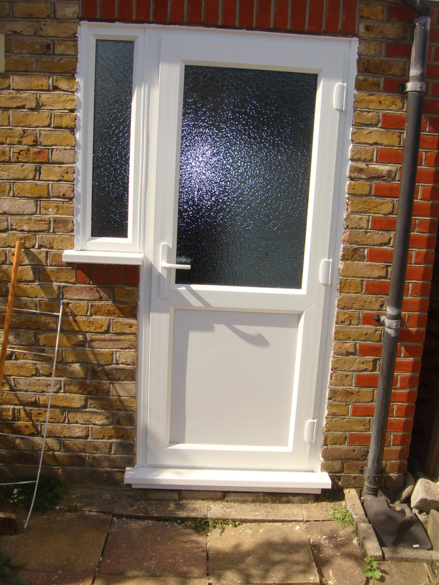 uPVC Back Door with panel in bottom.