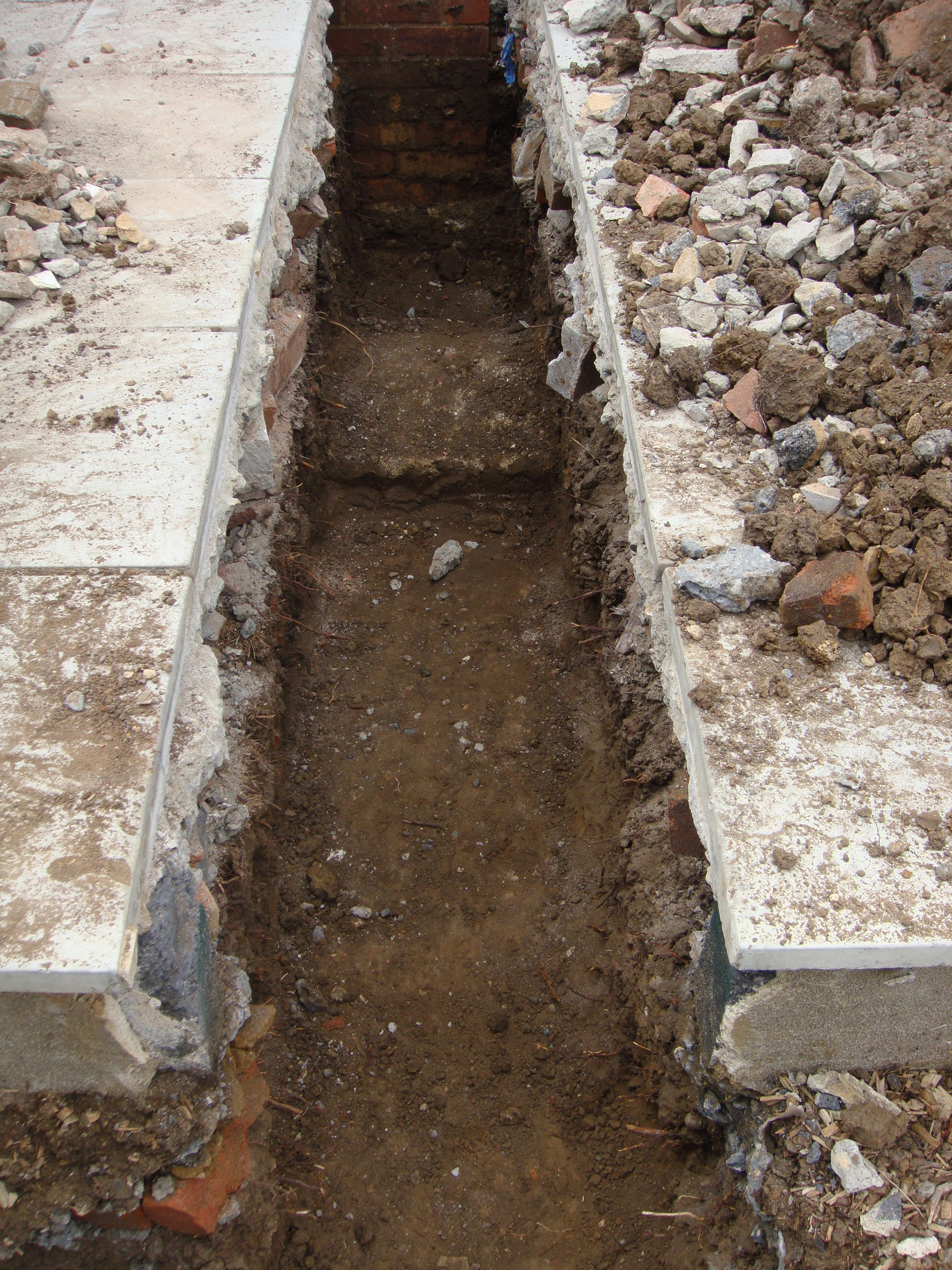 Digging metre deep footings